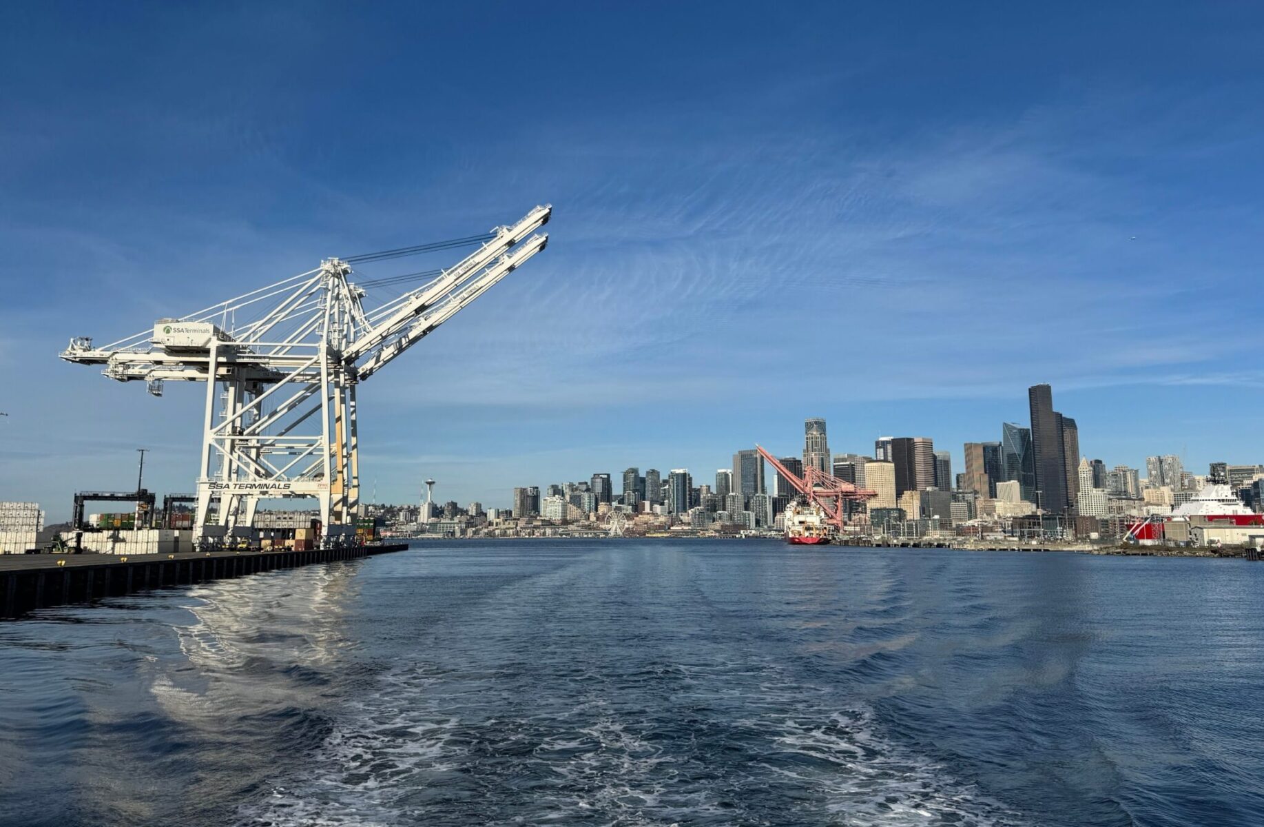 Seattle's skyline from the deck of a boat on a sunny day