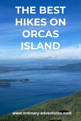 Islands and distant mountains seen from above at the summit of Mt Constitution. Text reads: The best hikes on Orcas Island