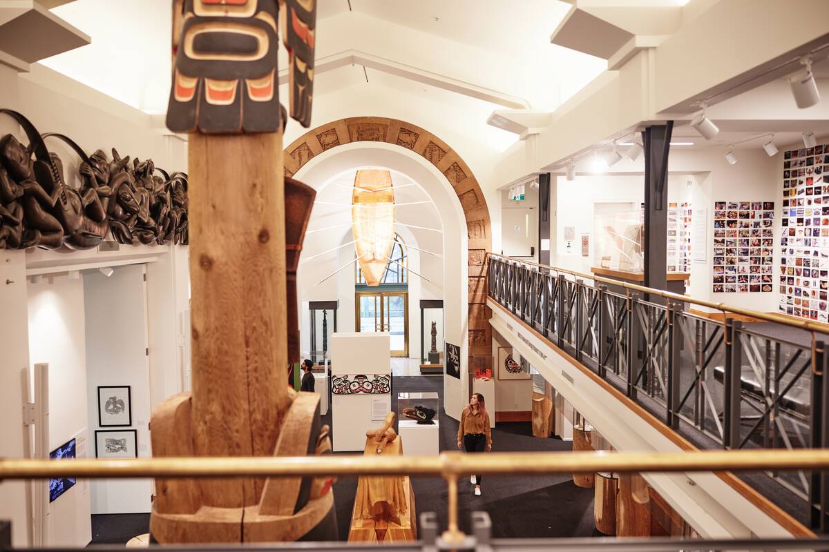 An art gallery with bright white walls and different types of Northwest Coast art