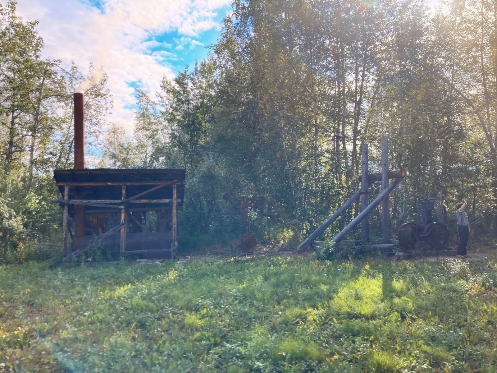 Historic mining equipment in a forest