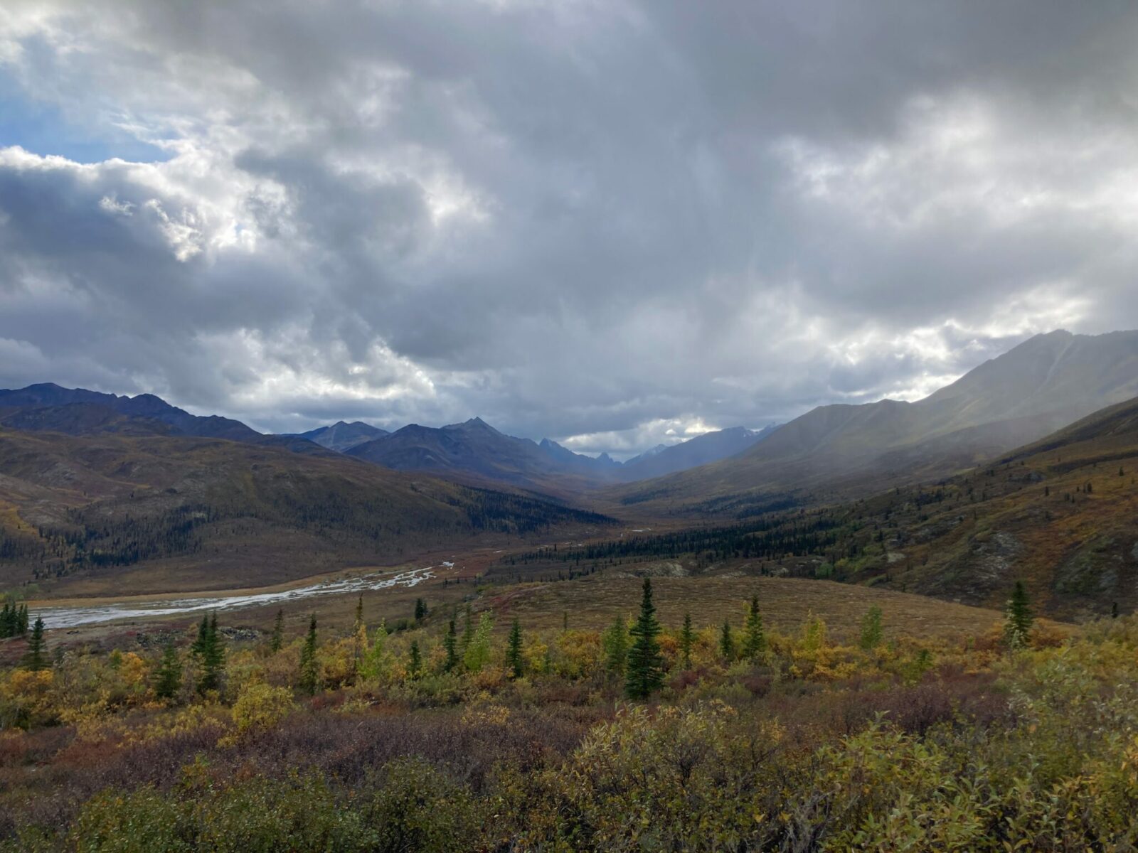 Dark clouds hanging around the valley of the North Klondike River in Tombstone Territorial Park on the Dempster Highway