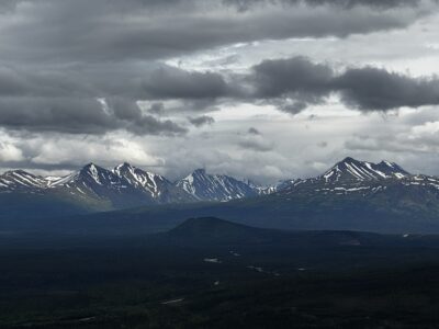 View of distant mountains on a cloudy day from a hike in Denali National Park